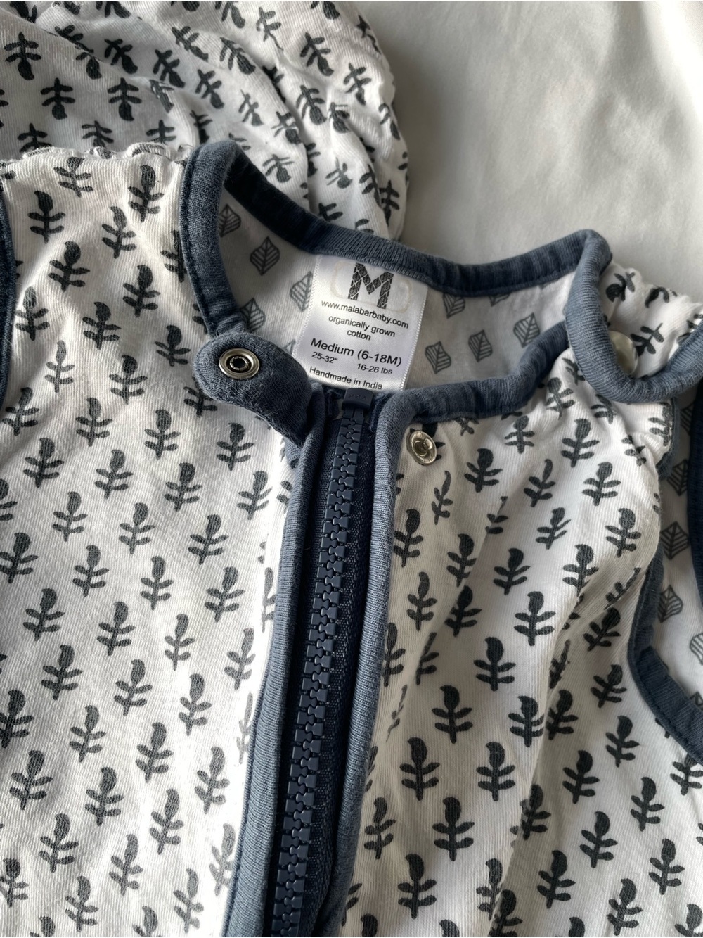 Malabar White Sleep Sack with Charcoal Leaf Print and Navy Trim